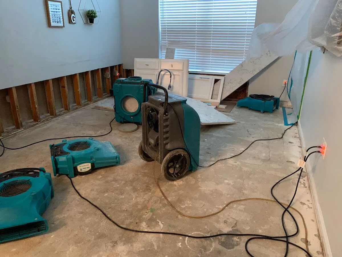 Dehumidifier in flood-cut room for Water Damage Restoration in Sun City West